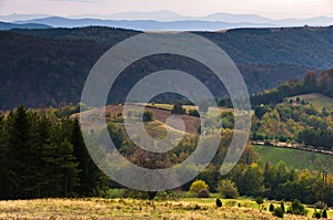 Viewpoint on a landscape of mount Bobija, peaks, hills, meadows and colorful forests