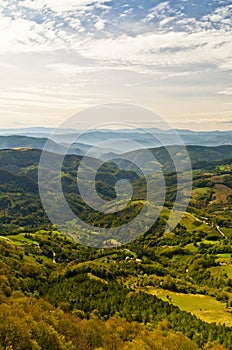 Viewpoint on a landscape of mount Bobija, peaks, hills, meadows and green forests