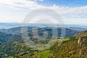 Viewpoint on a landscape of mount Bobija, peaks, hills, meadows and green forests