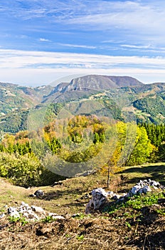 Viewpoint on a landscape of mount Bobija, peaks, hills, rocks, meadows and colorful forests