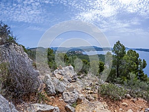 Viewpoint of the Majorca coastline with the view on the sea, cliffs, forest and summer sky, Mallorca, Balearic islands, Spain