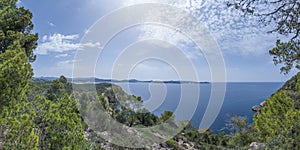 Viewpoint of the Majorca coastline with the view on the sea, cliffs, forest and summer sky, Mallorca, Balearic islands, Spain