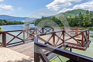 Viewpoint overlooking the Drina river house near the town of Bajina Basta in western Serbia photo