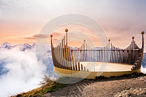 Viewpoint on summit of Mannlichen mountain near Lauterbrunnen and Grindelwald, Switzerland at sunset. Snowcovered peaks