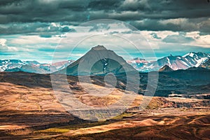 Viewpoint Valahnukur with lush volcanic mountain and moody sky in Icelandic highlands on summer at Thorsmork
