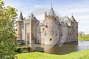 Views of the 700 year old castle `Muiderslot` with castle-moat, Netherlands