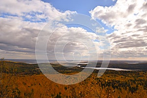 Views of autumn forests, lakes and passing clouds