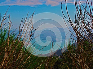 Views of the azure lake from the mountaintops.