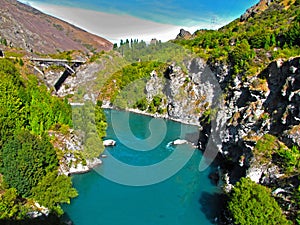 Views of the azure river from the mountaintops.