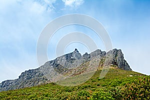 Views from the base of the famous table mountain in cape town, south africa with a blue sky