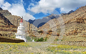 Views of a buddhist stupa and desert mountains on the way to Hemis monastery in Ladakh, India