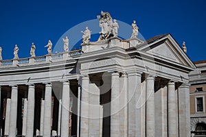 Views of columnata de Bernini buildings. Vatican City, Italy photo