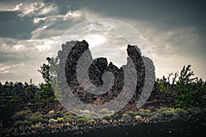 Views of fields covered with lava and plants on the horizon