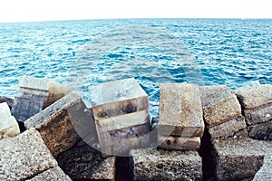 Views of the Fuengirola dike in the harbor at sunset