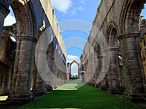 Views of the grounds of Fountains abbey in North Yorkshire England United Kingdom
