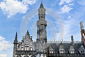 Views of the Historium tower on the market square in Bruges, Belgium photo