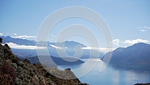 views of the incredible roys peak mountain and blue sky, new zealand