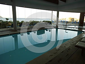 Views of the indoor pool and the Mediterranean Sea. Ramla Bay Resort, Triq Ir-Ramla, Il-Mellieha, Malta