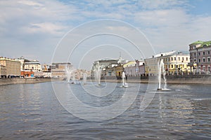 Views Kadashevskaya and Bolotnaya embankments and fountains photo