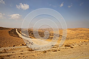 Views from King`s Highway road & Wadi Musa, across the desert between Aqaba & Petra, Jordan photo