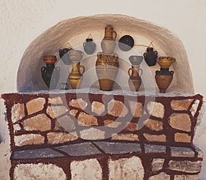 Views of moroccan ceramic vase isolated in white wall niche