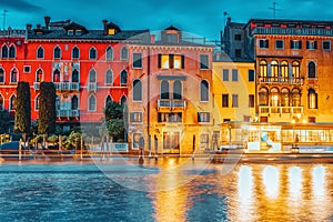 Views of the most beautiful canal of Venice - Grand Canal water streets, boats, gondolas, mansions along. Night view. Italy