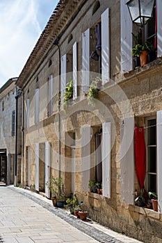 Views of old houses and streets of medieval town St. Emilion, production of red Bordeaux wine on cru class vineyards in Saint-