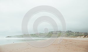 Views of Oyambre beach in Cantabria, north of Spain at cloudy day