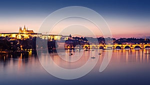 views of the Prague Castle and the Charles bridge over the Vltava