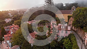 Views of Sintra city, Portugal, shot from a drone on a foggy morning.