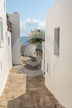 Views of streets and houses specific to Panarea island in a summer day, Aeolian Islands, Italy