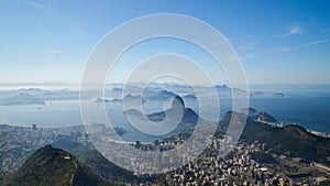 Views to the Rio harbor and Sugar Loaf Mountain from Corcovado in Rio de Janeiro, Brazil.