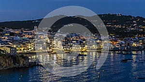 Views of the town of `Calella de Palafrugell` at night. photo