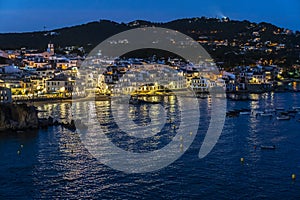 Views of the town of `Calella de Palafrugell` at night. photo