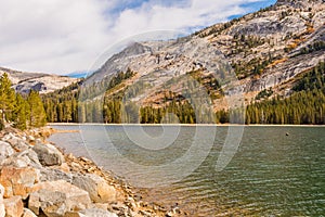 Views of the water and surroundings of Lake Tenaya at one of the entrances to Yosemite National Park, California, USA