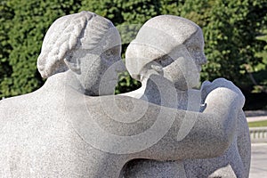 Vigeland park, Oslo, Norway, two women looking to side.