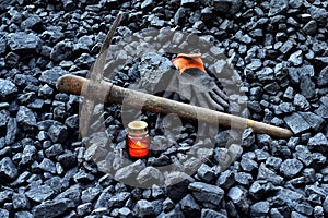 Vigil light, candle with the miner belongings gloves, pickaxe