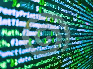 Young business crew working with startup. Data encryption security code on a computer display. Javascript functions, variables,