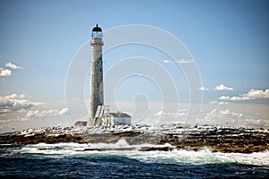 Vignette of Tallest Lighthouse in New England at Low Tide on Sum photo