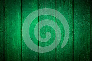 Vignetted Green Wooden Background photo
