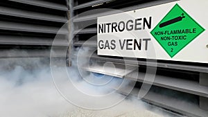 Vigorous discharge of dense white nitrogen gas fumes