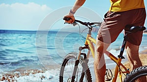 A Vigorous Young Cyclist in Bright Attire Conquers the Beach Terrain, with the Serene Sea Guiding His Way