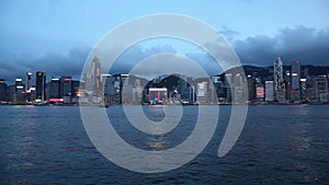 VIictoria Harbour in Central Hong Kong viewed from Tsim Sha Tsui in Kowloon, Hong Kong at Blue Hour 1080p