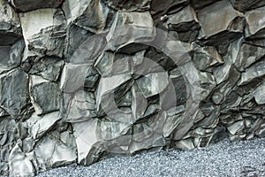 Vik beach icleand with hexagonal basalt rock formations insid
