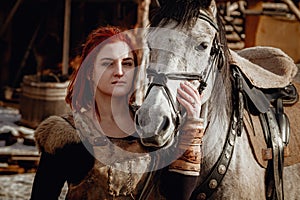 Viking girl. Reconstruction of a medieval scene