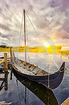 Viking old boat in Denmark at sunset