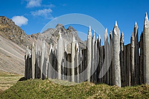 Viking village fence and rocky peaks