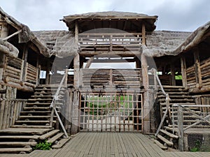 Viking village, historic buildings of the Scandinavian warriors, Vikings, the barbarians and their homes. Life and life in the photo