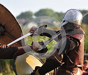 Viking warriors fight.