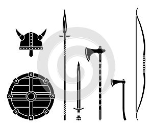 Viking weapons - old medieval shield, helmet, hatchet, sword, ax, axe, bow, spear. Set of warrior equipment.
